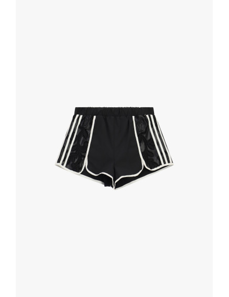 Hotpants met geperforeerde inzetstukken en contrasterende biezen Dixie