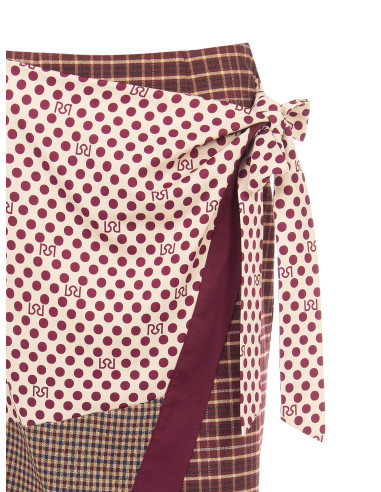Lange patchwork-wikkelrok met knoopdetail aan de zijkant Rinascimento